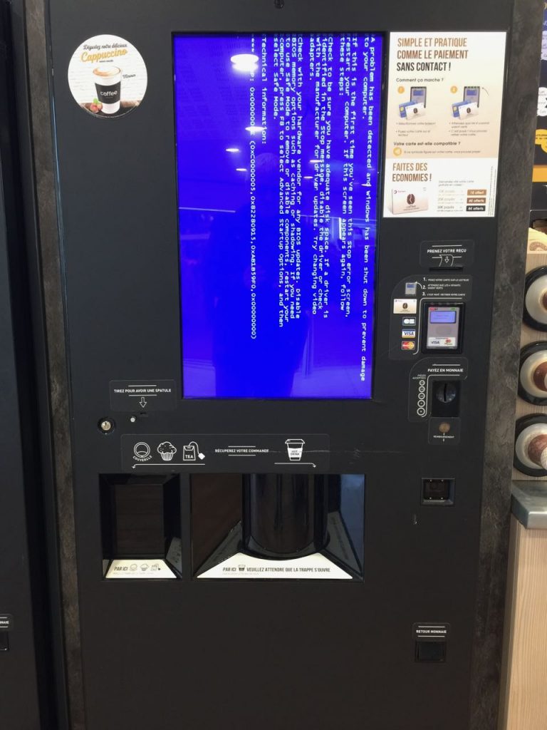 Blue screen of death display on coffee machine
